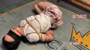 Bunned Brunette Beauty Surrenders to Shibari Dream