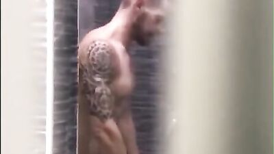 Compilation of strong guys posing naked while taking a shower