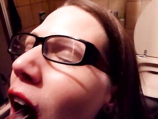 Nerdy librarian with glasses likes to gulp urinate