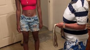 African girl gets spanked for wearing short shorts