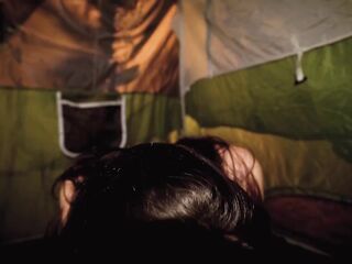 Lustful teen was masturbating in the tent, the other night, until she started moaning from joy