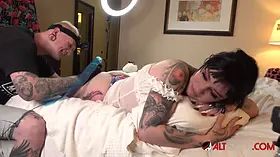 Busty brunette Misha Montana gets a new leg tattoo