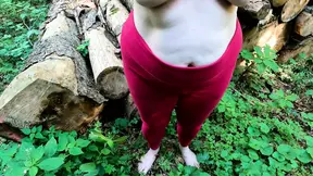 Barefoot and topless in the forest