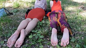 Two beauties, Anastasia and Madlena, show off their flexible, wide feet in a public park (Part 3 of 6)