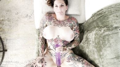 Tattooed Milf Fucks Herself with Toys and Squirts Everywhere!