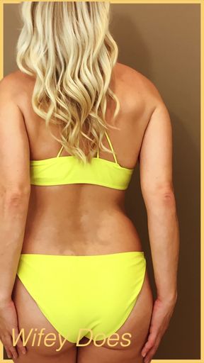 Wifey wears a skimpy yellow bikini