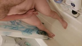 Solo Bi male desperately pissing in the shower
