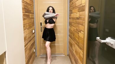 Sauna striptease unzips as the hot milf flexes her curves