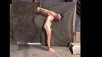 naked pathetic dirty slave outside tied up hands behind back, weights on his testicles, CMNM