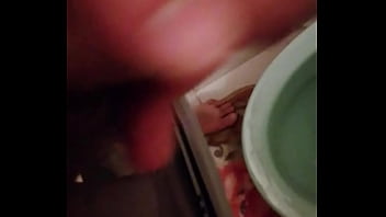Cock pissing in the toilet