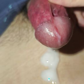 Rub the cock frenulum with your thumb and ejaculate w