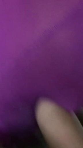 Pink nylon mask and grey pantyhose legs
