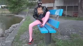 Pierced Latex Girl in Pink Leggings, Blouse, Jacket, Demask Corsett & Mask Gloves walks in the city with piercings rings hanging out & Masturbating Rubber Dildo PART II