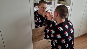 Naughty young horny daddy sucking big dildo in front of mirror dressed in Christmas sweater ...