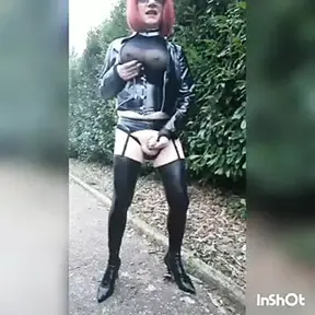 out of a sissy in vinyl outfit and fur coat