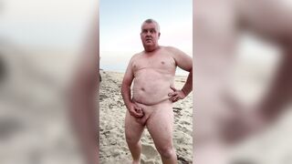 Naked, public beach wanking