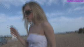 Michelle Moist smoking Marlboro reds while walking