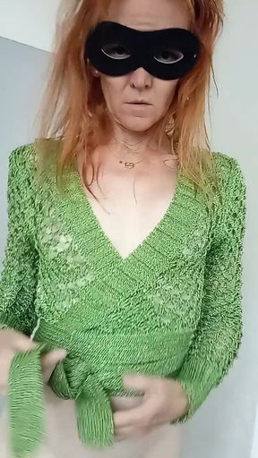 In green cardigan with chunky knits