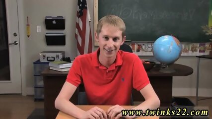 Gay boys sex stories Cute blonde twink Ace Sterling is sitting at a desk wearing a red