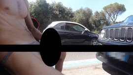 Cumshot in slowmotion in the street with passing cars