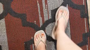 Feet in flip flops