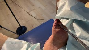 Dominatrix mistress April - clinical cock sewing