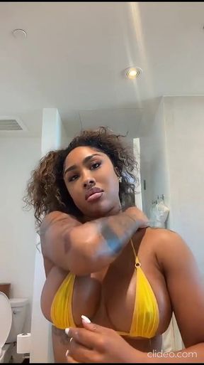 Big-titted babe shows off her boobs