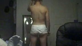 Skanky ebony whore exposes her tight tits and booty in undies