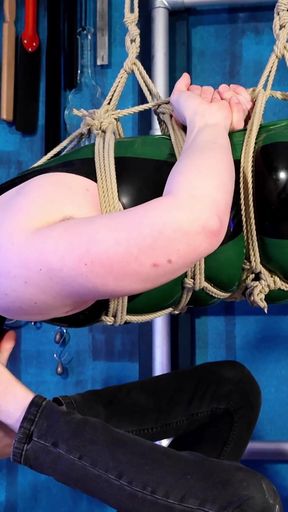 The Chastity Slave Is Bound in Ropes and Tormented with Feet