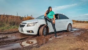 CAR STUCK Christina got stuck in a muddy puddle with her boots