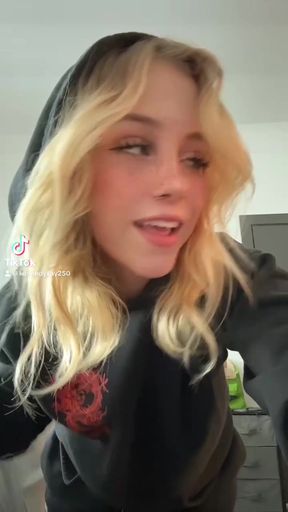 Blonde woman in hoodie