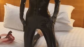 tease in latex and hood and seath panties