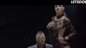 Blindfolded man gets fingers played with in a seductive suit