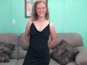 Curly-haired blonde with small tits undresses and touches her pussy