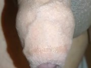 Slowmotion precum drool with foreskin hanging up close and personal