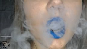 Vaping close-up with blue lipstick