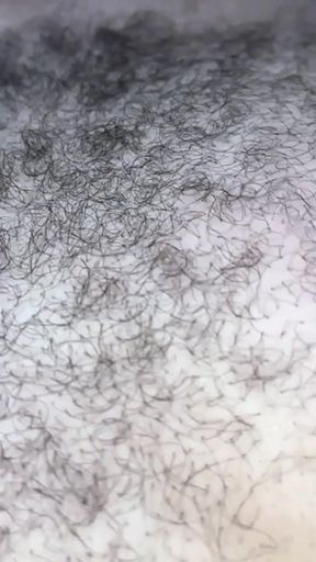 Key moment from "Chubby gay bear shaking moobs + playing with big nipples"