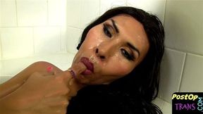 Hot big tittied asian ts bathes her new pussy