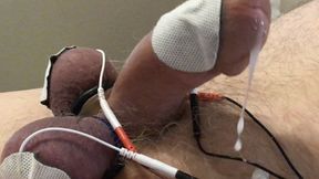 Long estim edging session with ball slapping brings out the cum