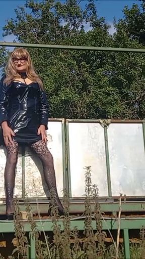 Crossdresser Playing Down on the Farm in PVC   Clip 2