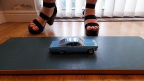 Giantess Lou crushes a Chevrolet Impala in big black chucky heels low ground view