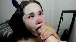 Sexy Clown with Inked Boobs Swallows a Mouthful