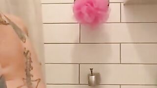 Mandii sticks anal beads inside her tight little asshole inside the shower