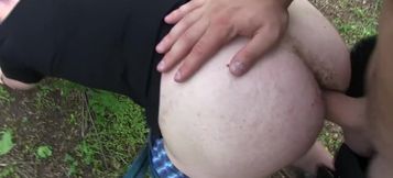 Slender twink sucks cock half-naked and experiences bareback anal