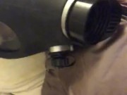 Playing with Vibrator in Shiny Down Jacket Gas Mask and Shiny Leggings