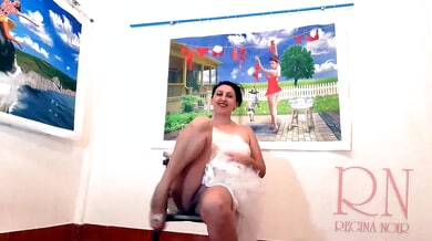 Woman in white wedding dress exposes herself in art gallery