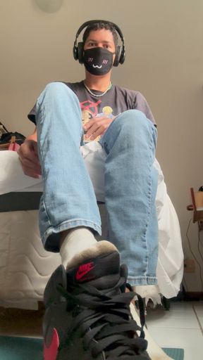 My little foot, socks and Nike, after a long day