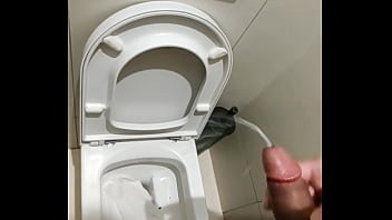 Public toilet jerk off. Big load of cum.