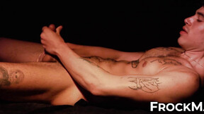 Chick Miguel lays nude & passionately strokes his prick