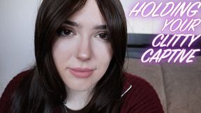 HOLDING YOUR CLITTY CAPTIVE